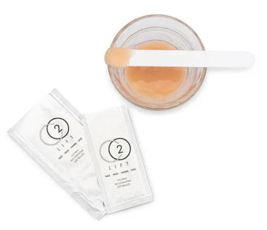 CO2Lift Pro two-part carboxy gel mask mixed in a bowl with applicator