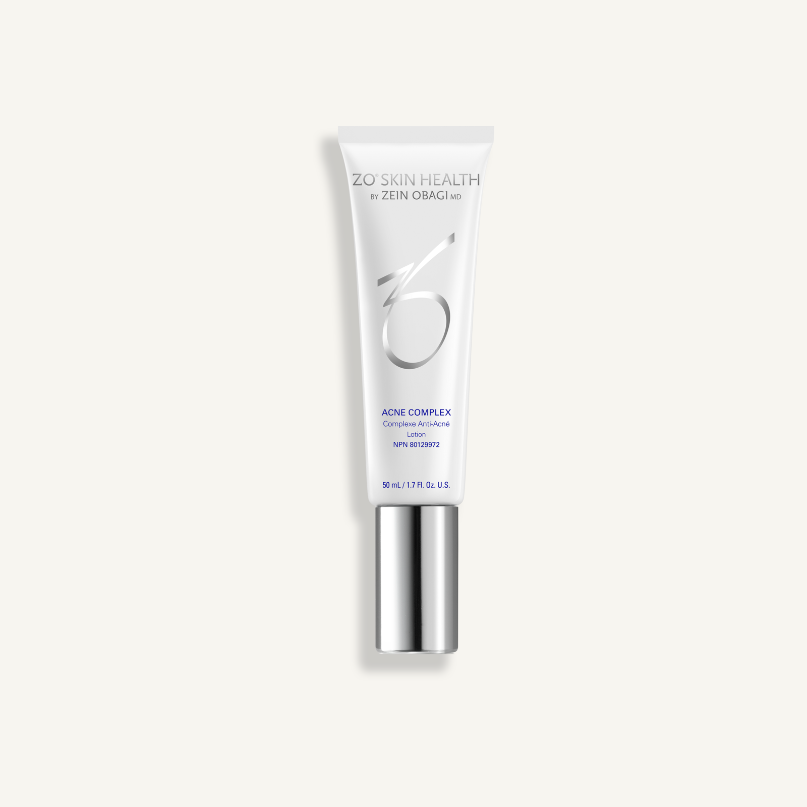 ZO Acne Complex on a warm cream background