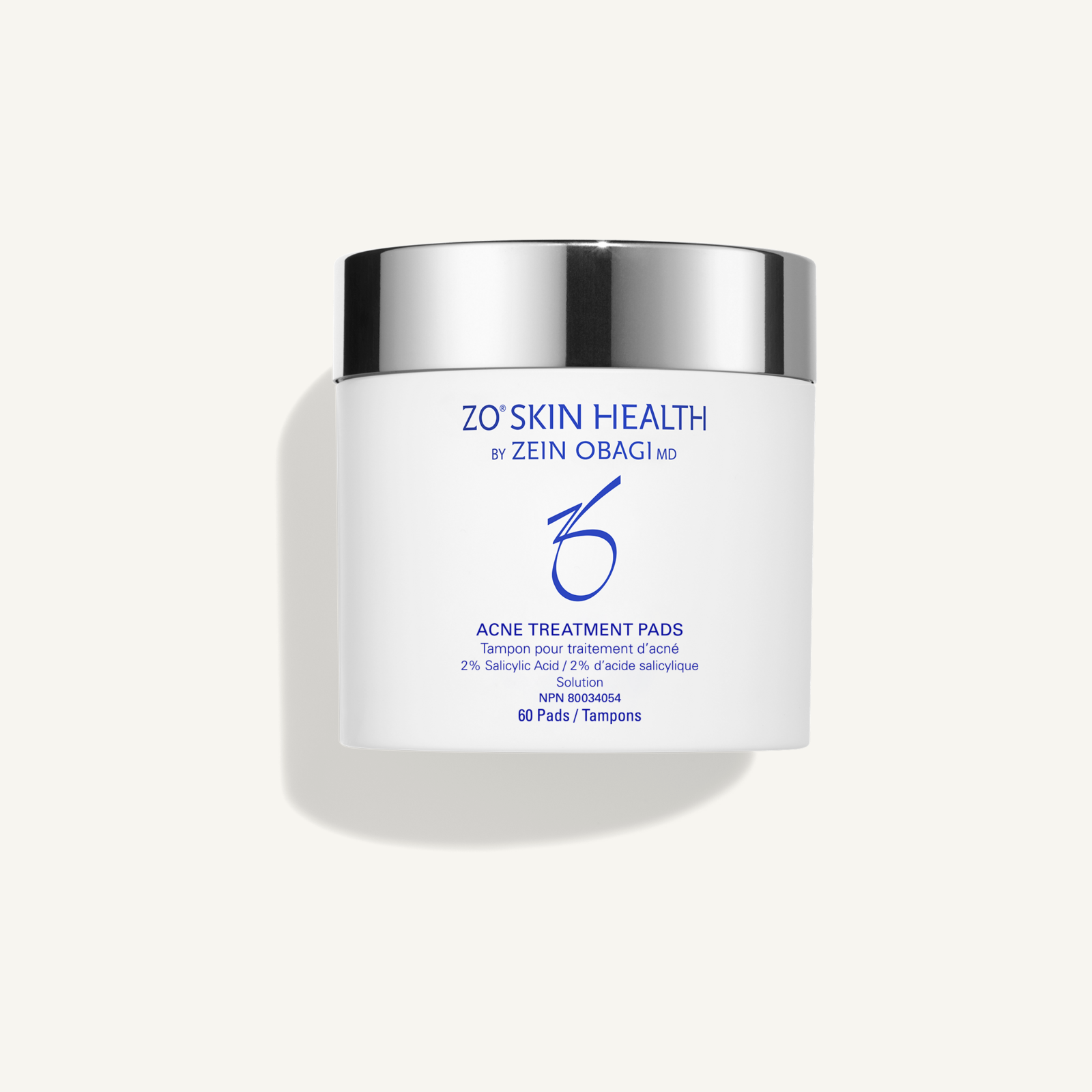 ZO Acne Treatment Pads 60-pad jar on cream background