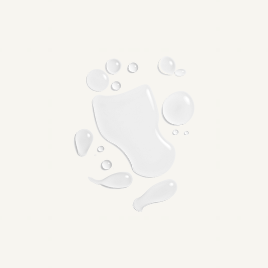 Clear ZO Calming Toner liquid texture on cream background