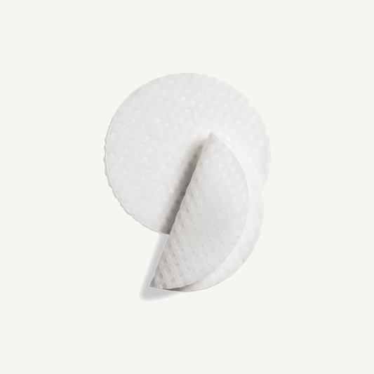 Textured ZO facial toner pads on cream background