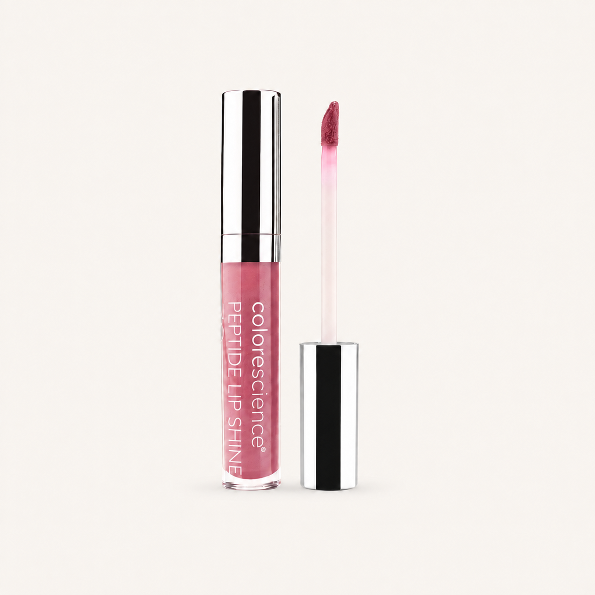 Colorescience Peptide Lip Shine in Rose with applicator on a warm cream background