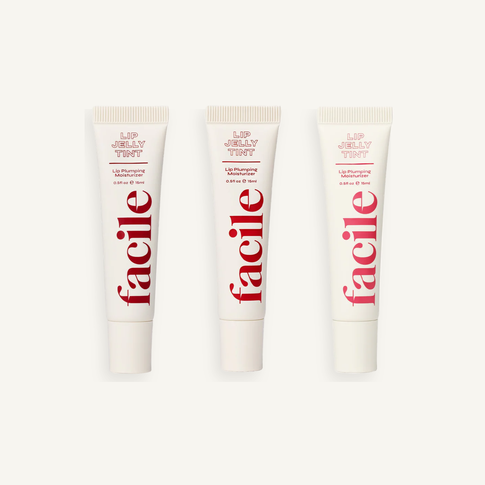 Facile Berry Tinted Lip Jelly Set with Berry, Rose and Rouge tubes on a warm cream background