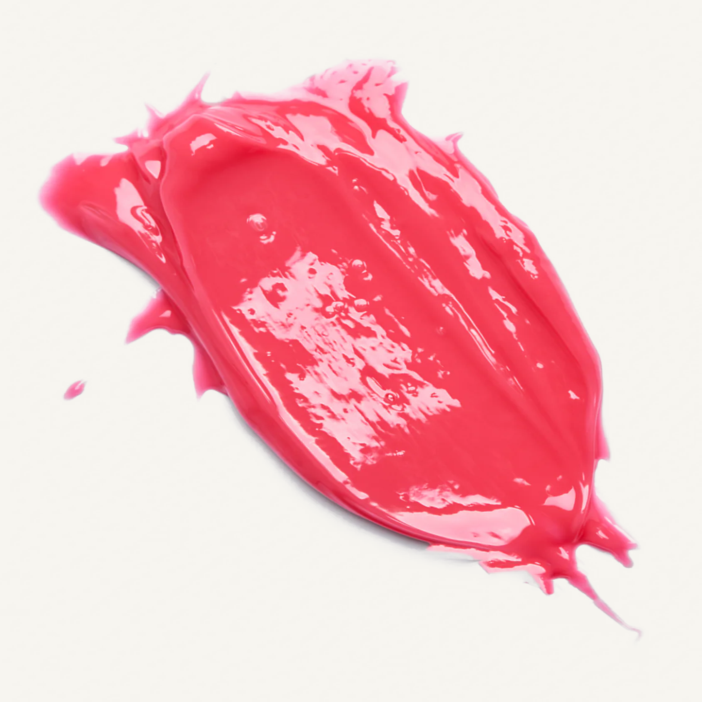Facile Lip Jelly Rose glossy pink texture swatch on a warm cream background