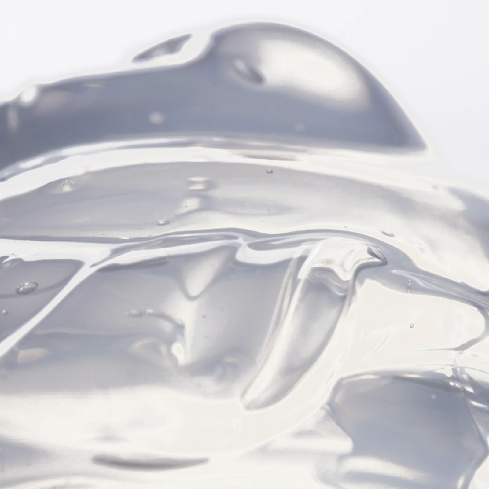 Facile Lip Jelly Untinted clear glossy gel texture on a warm cream background